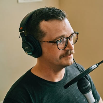 Home podcaster template host img 2